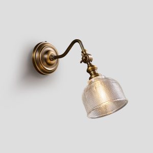 Vintage brass wall light with elegant curved swing arm and textured glass shade - Model B