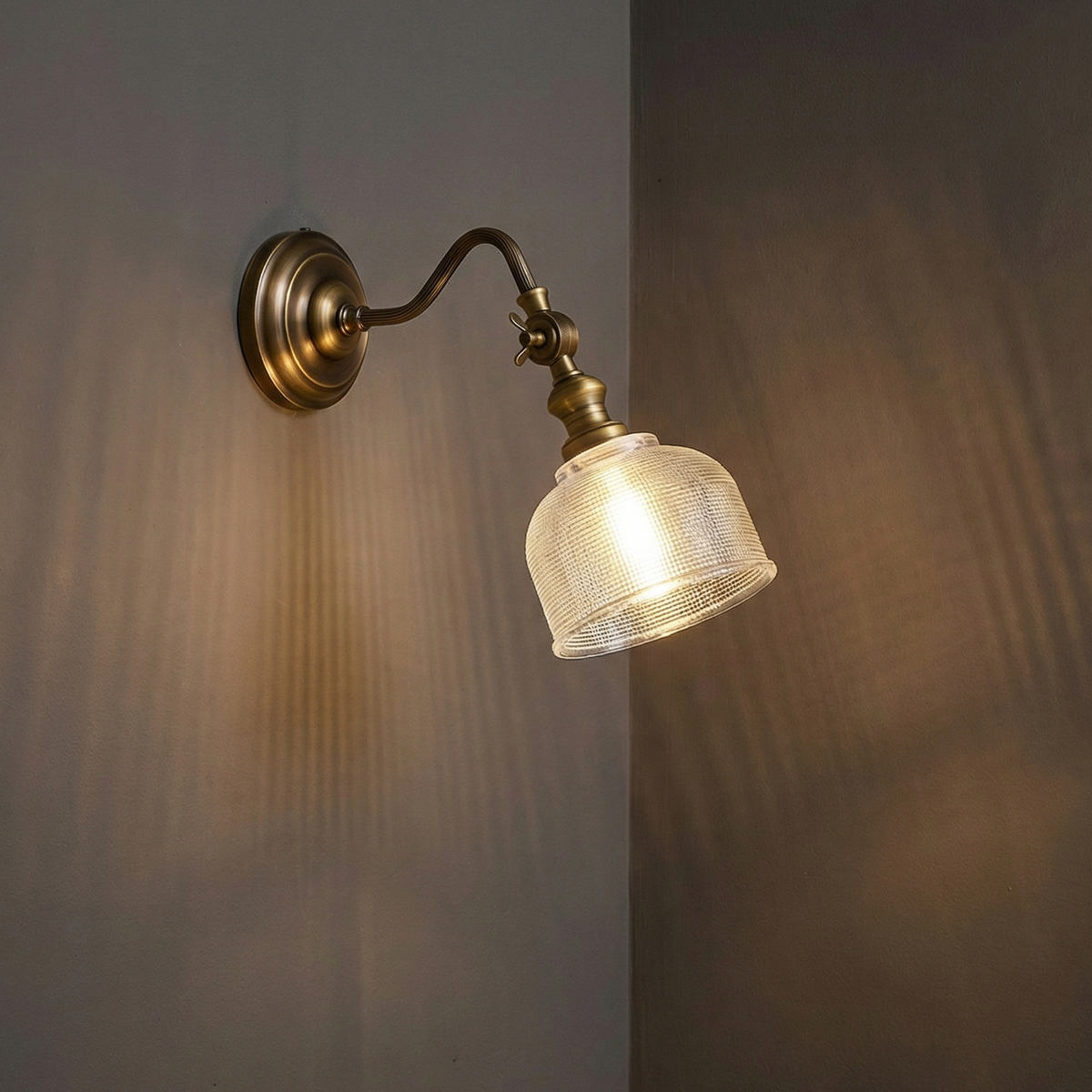 Adjustable Swing Arm Sconce 6 Vintage brass wall light with elegant curved swing arm and textured glass shade - Model B