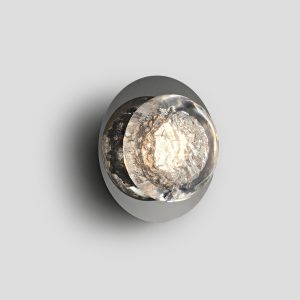Front view studio shot of a minimalist round ice glass sconce with chrome base on a plain light grey background.